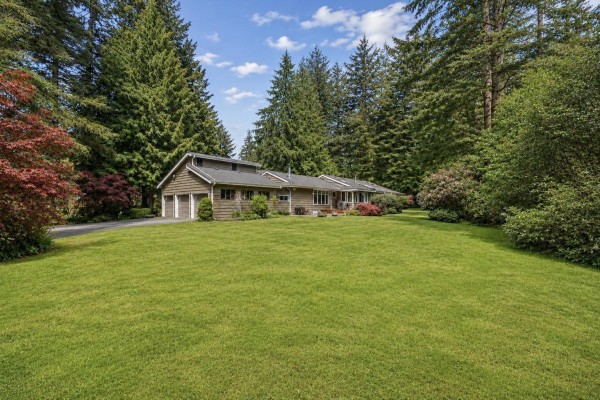 Floor plan of a large single-story home showing multiple bedrooms, living areas, and attached garage. - 13666 30 Avenue, Surrey