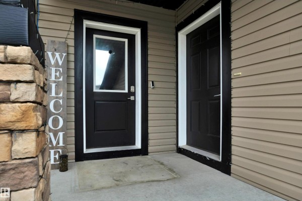 Family room - 137 Awentia St, Leduc, AB T9E1H4 Photo 4