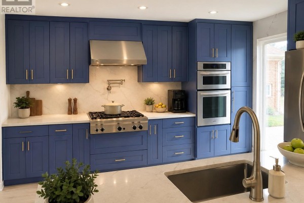 Modern kitchen with navy blue cabinets, stainless steel appliances, and marble backsplash. - 137 Hudson Crescent, Bradford West Gwillimbury