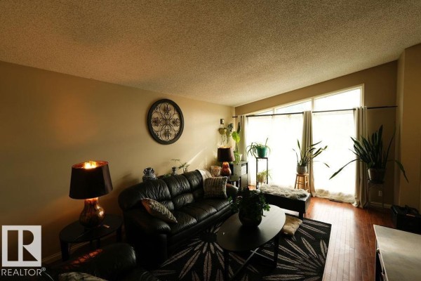 Family room - 13836 26 St Nw, Edmonton, AB T5Y1B4 Photo 4