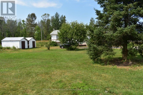 Primary Bedroom - 1390 69 Highway N, Parry Sound Remote Area, ON P0G1A0 Photo 3