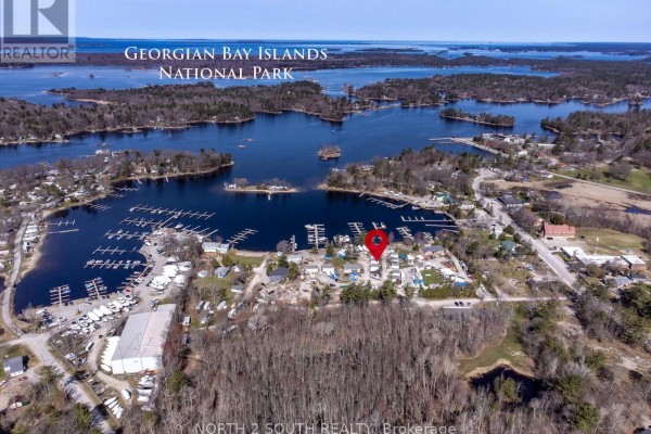Aerial view of Georgian Bay Islands National Park and surrounding waterfront communities and marinas. - 14-42 Bluewater Road, Georgian Bay