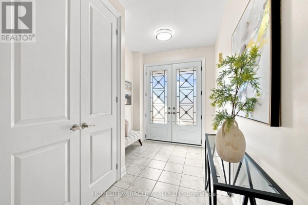 Double doors with decorative glass and tile flooring - 14 Zenith Avenue Vaughan