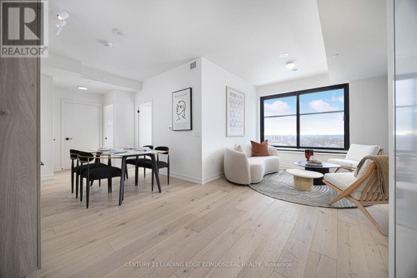 Living room - 1402 - 181 Sterling Road, Toronto, ON M6R2B2 Photo 3