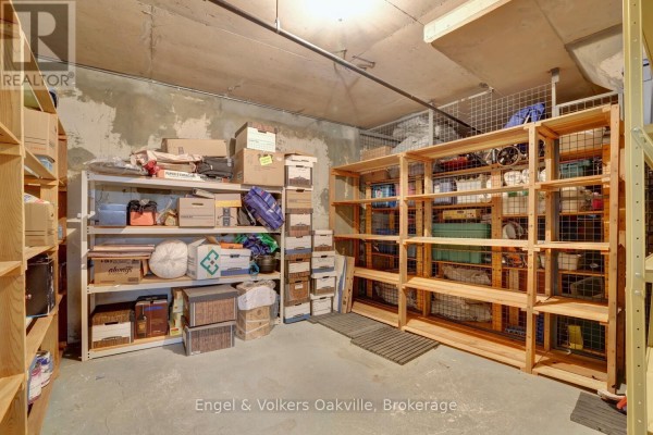 Storage area with shelving and boxes - 1402 - 442 Maple Avenue Burlington