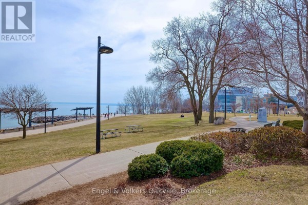 Park with waterfront, picnic tables, and walking path - 1402 - 442 Maple Avenue Burlington