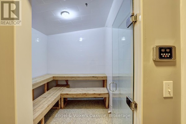 Sauna room with wooden benches and glass door - 1402 - 442 Maple Avenue Burlington