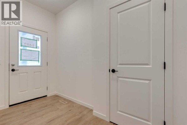 Bedroom - 1402 Bayview Crescent Sw, Airdrie, AB T4B5N9 Photo 4