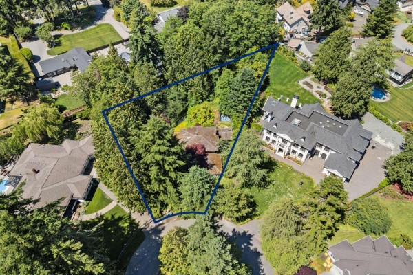 Aerial overview of the property at 14069 26a Avenue, Surrey, with text indicating lot size and zoning. - 14069 26a Avenue, Surrey