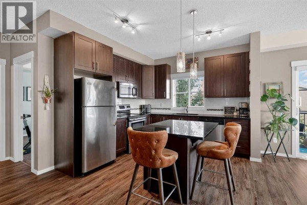 Living room - 1409, 755 Copperpond Boulevard Se, Calgary, AB T2Z4R2 Photo 4
