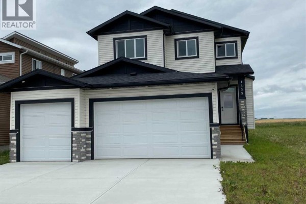 1409 Aldrich Place Sw, Carstairs, AB, photo 2