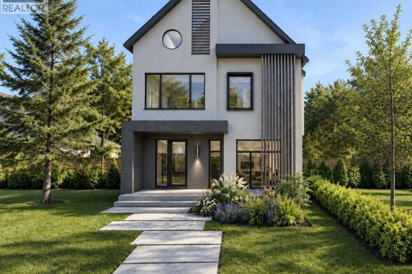 Modern two-story house in daylight featuring a manicured lawn, pathway, and lush landscaping. - 1416 20 Street Nw, Calgary
