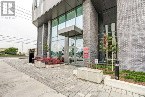 Glass and brick entrance to the condominium building at 10 Abeja Street. - 1419 - 10 Abeja Street, Vaughan