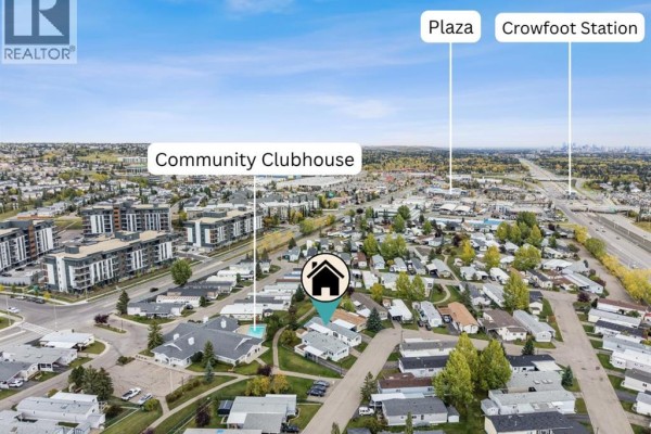 Aerial view showcasing the mobile home's location, with labels pointing to Crowchild Trail NW, Crowfoot Station, and a plaza. - 142, 99 Arbour Lake Road, Calgary
