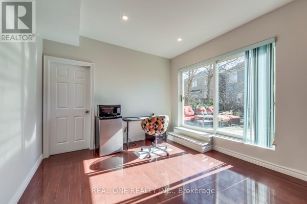 Room with desk, mini-fridge, microwave and patio access - 1426 Redwing Court Oakville