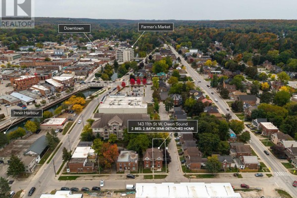 Aerial view of the semi-detached home at 143 11th St W, Owen Sound, near downtown. - 143 11th Street W, Owen Sound