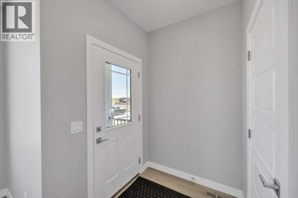 Living room - 143 Amblefield Avenue Nw, Calgary, AB T3P2B8 Photo 2