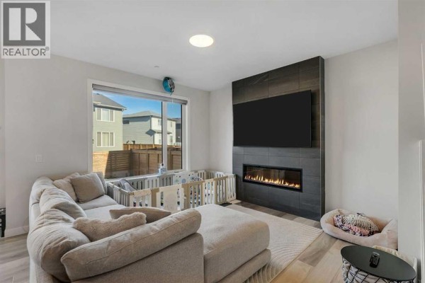 Living room - 144 Hotchkiss Way Se, Calgary, AB T3S0G2 Photo 5