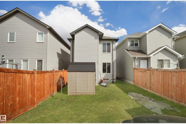 Family room - 1442 33a St Nw, Edmonton, AB T6T0V3 Photo 4
