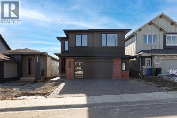 Den - 141 Creekstone Hill Sw, Calgary, AB T2X5G6 Photo 2