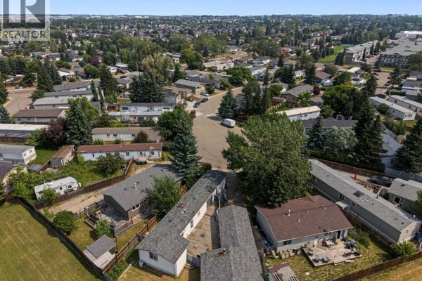 Overhead view of the mobile home community and surrounding residential areas. - 145 Spring Haven Mews Se, Airdrie