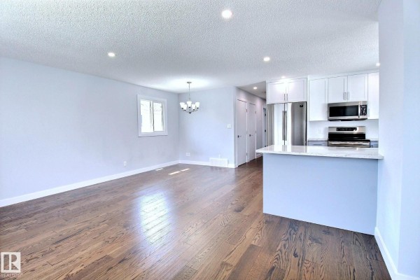 Kitchen - 14732 32 St Nw, Edmonton, AB T5Y2G3 Photo 3