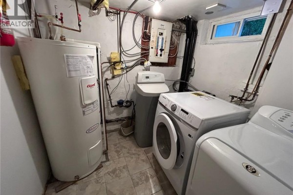 Washer, dryer, water heater & electrical panel in laundry room - 148 Weber Street N Unit# A Waterloo
