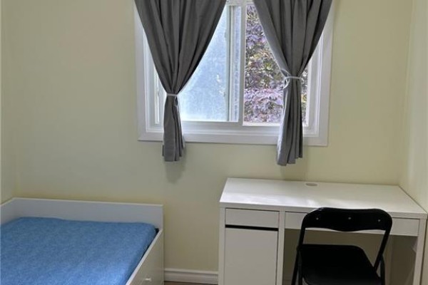 Bedroom with bed, desk, and chair - 148 Weber Street N Unit# A Waterloo