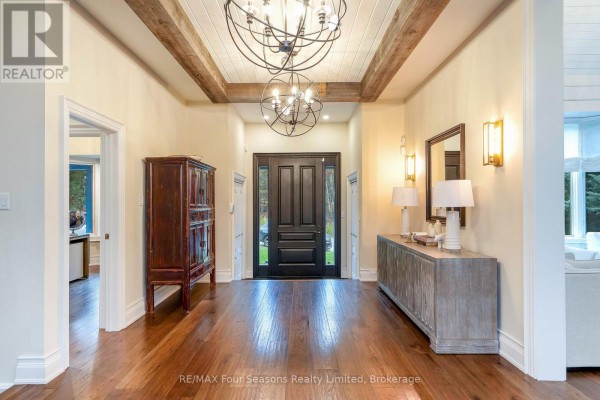 Dining area with large wooden table, pendant lights, and bay windows - 149 Aspen Way, Blue Mountains
