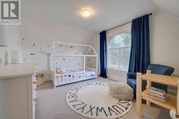 Children's bedroom with house bed and alphabet rug - 15 Gilholm Avenue Cambridge