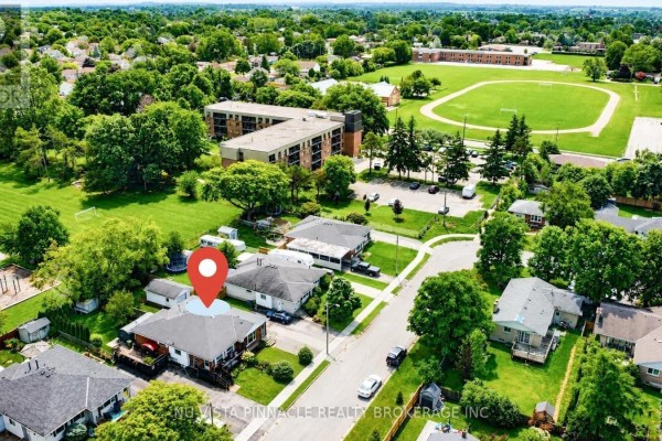 Suburban neighborhood with homes, apartment building and sports field - 15 Gregory Place St Thomas