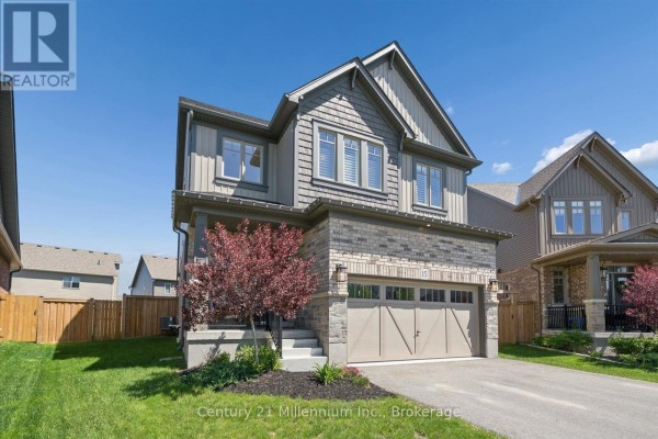 Covered back deck with a barbecue and seating area, overlooking a green lawn. - 15 Maidens Crescent, Collingwood