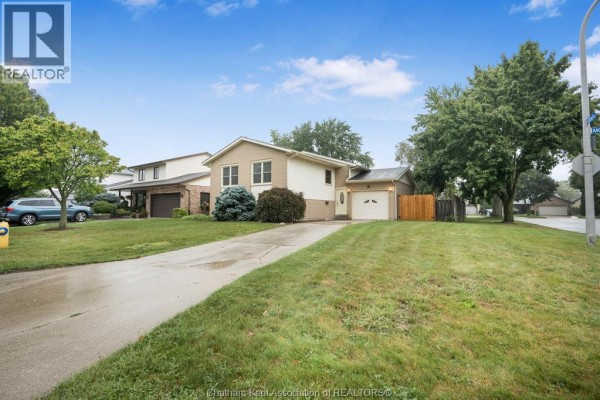 Entryway with a decorative door and attached garage - 15 Monarch Drive, Chatham
