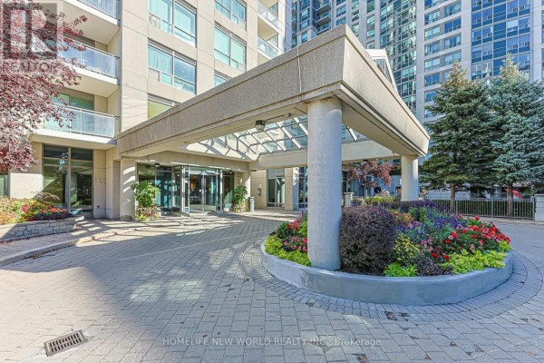 Interior apartment building hallway with patterned carpet and wood trim. - 1501 - 21 Hillcrest Avenue, Toronto