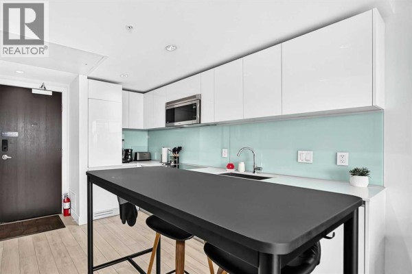 Living room/Dining room - 1503, 1188 3 Street Se, Calgary, AB T2G1H7 Photo 4