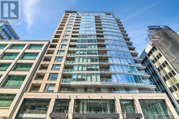 View looking up at a modern glass-and-concrete high-rise apartment building exterior. - 1504 - 101 Queen Street, Ottawa