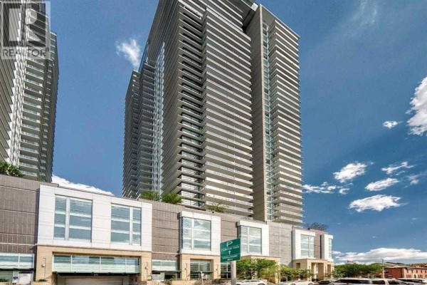 Exterior view of The Guardian building's modern design with balconies and glass panels. - 1507, 1188 3 Street Se, Calgary
