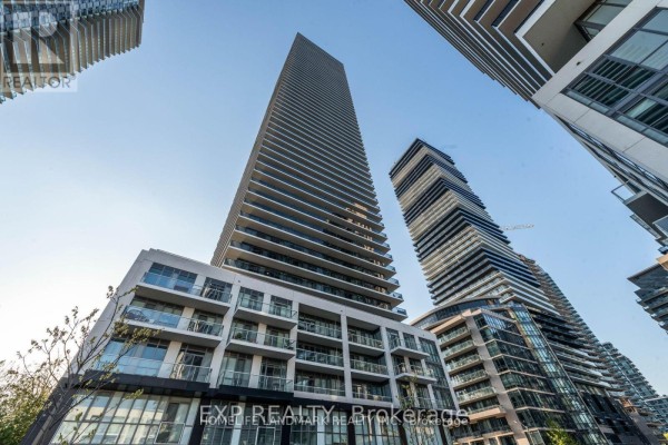 Exterior of the Vita On The Lake condo building in Toronto, looking up. - # 1508 - 70 Annie Craig Dr Drive S, Toronto