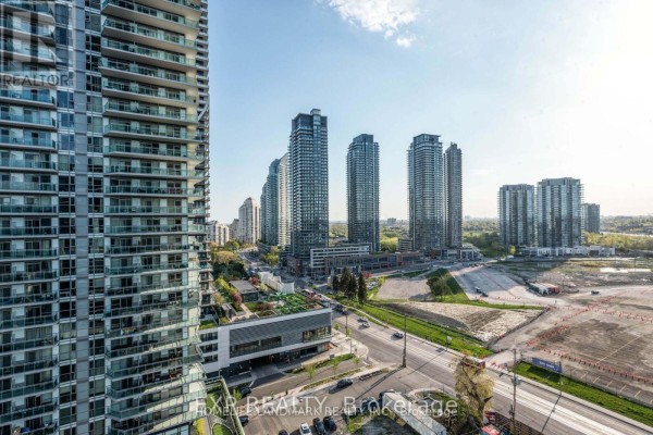 View of the city skyline from a high floor of the condo building. - # 1508 - 70 Annie Craig Dr Drive S, Toronto