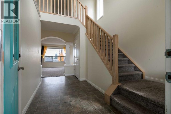 Foyer - 151 Bow Ridge Crescent, Cochrane, AB T4C1V2 Photo 4