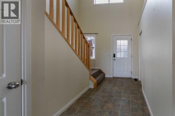 Kitchen - 151 Bow Ridge Crescent, Cochrane, AB T4C1V2 Photo 5