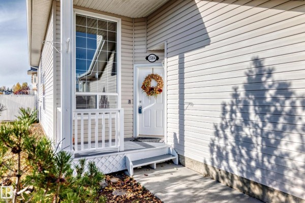 Family room - 15104 45 St Nw, Edmonton, AB T5Y3B1 Photo 3