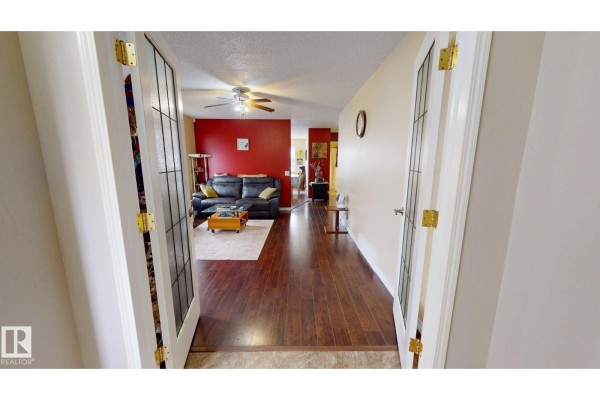 Family room - 15135 43 St Nw, Edmonton, AB T5Y3B3 Photo 4