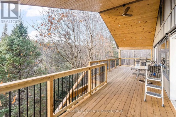 Covered wooden deck with grill and patio set - 1520 Rosemount Road Tay