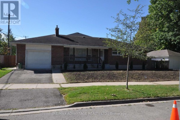 Red brick bungalow with attached garage and front porch on a sunny day. - 153 Langarth Street W, London South