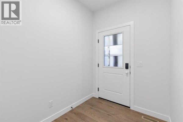 Pantry - 153 Snowberry Common Se, Calgary, AB T3M4G6 Photo 3