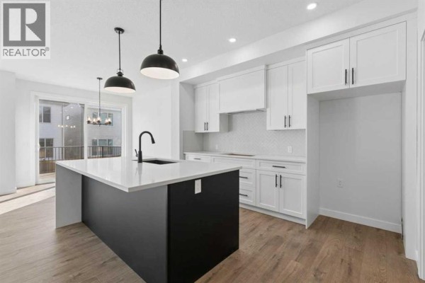 Kitchen - 153 Snowberry Common Se, Calgary, AB T3M4G6 Photo 4