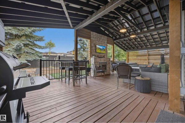 Family room - 15552 49 St Nw, Edmonton, AB T5Y0B8 Photo 4