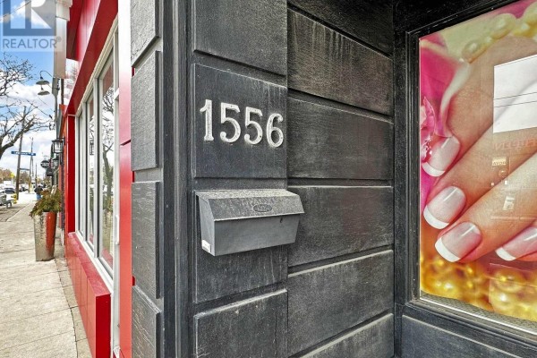 Close-up of the address number 1556 on the building exterior - 1556 Avenue Road, Toronto