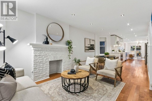 Family room - 156 Rhodes Avenue, Toronto, ON M4L3A1 Photo 2